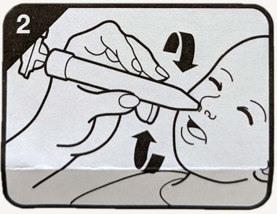 A diagram on how to use a nasal passage suction for removing snot from a baby.
